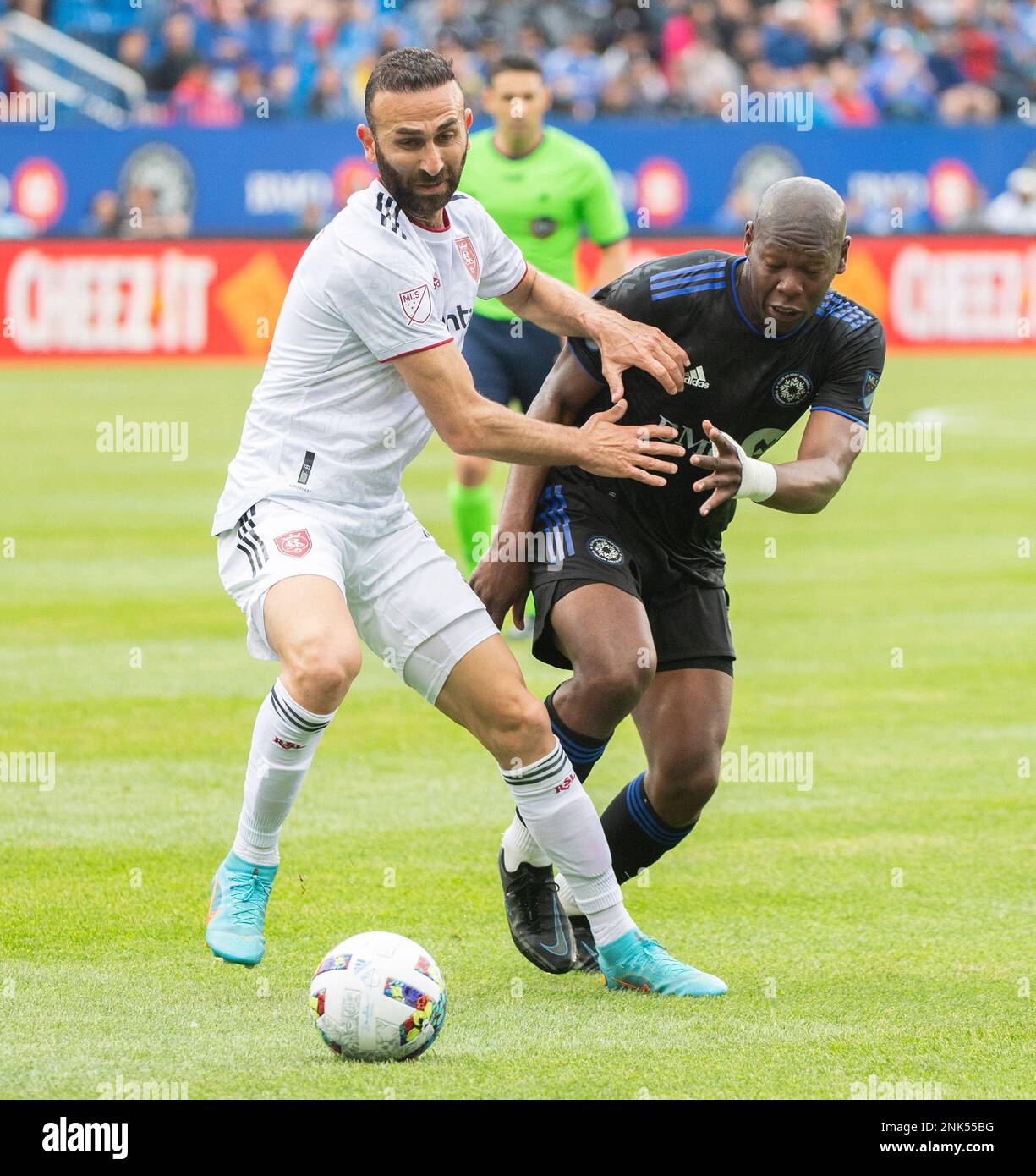 Real Salt Lake's Justin Meram challenges CF Montreal's Kamal Miller during the first-half of an MLS soccer match in Montreal, Sunday, May 22, 2022. (Graham Hughes/The Canadian Press via AP) Banque D'Images