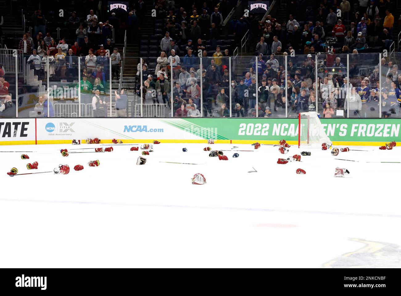 BOSTON, MA APRIL 09 Denver equipment litters the ice after the NCAA