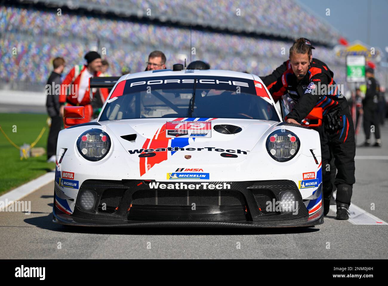 DAYTONA, FL - JANUARY 23: The crew of the #79 WeatherTech Racing ...