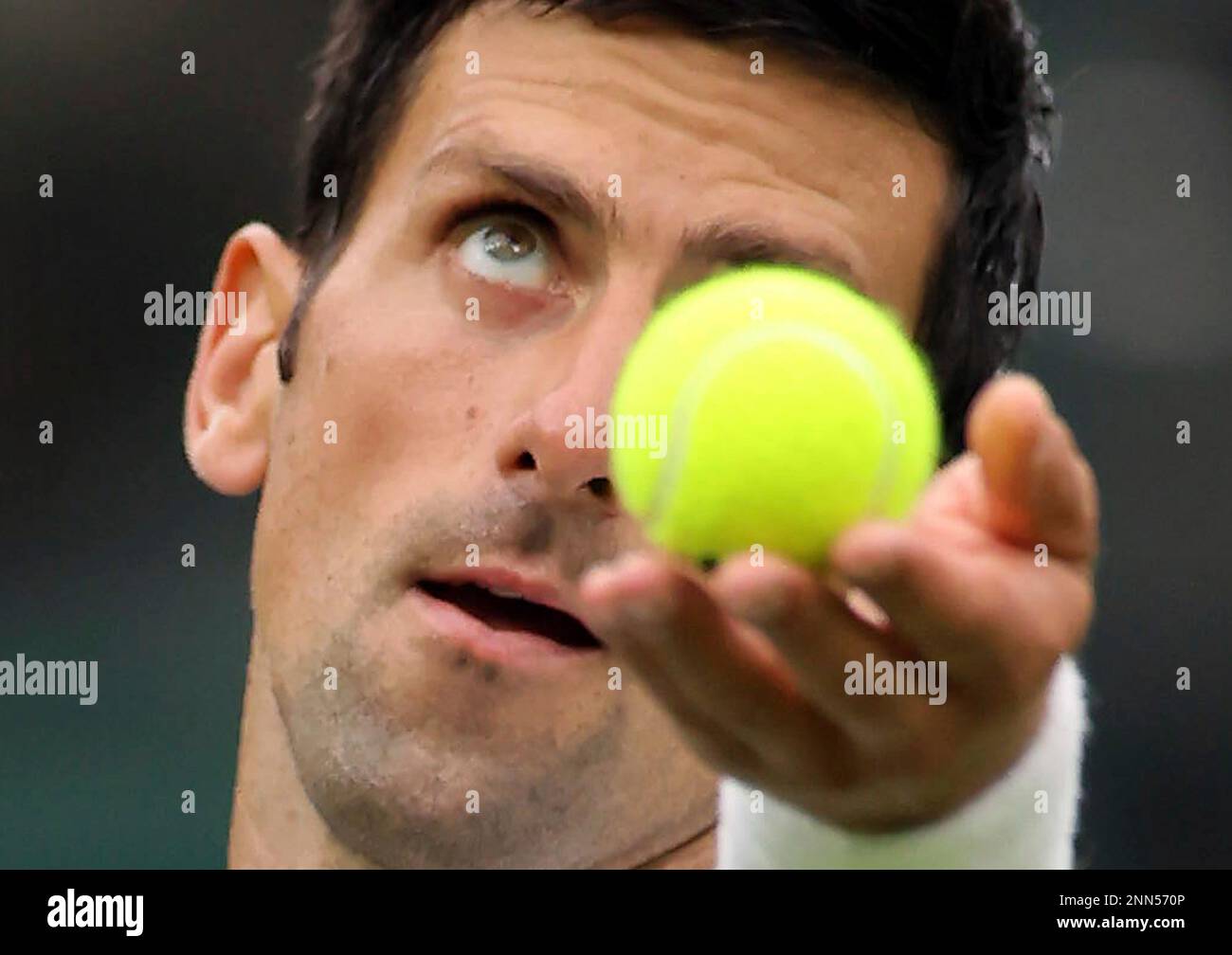 Novak Djokovic of Serbia serves a ball during the men's singles first round of the Championships, Wimbledon against Jack Draper of Great Britain at the All England Lawn Tennis and Croquet Club in London, United Kingdom on June 28, 2021. ( The Yomiuri Shimbun via AP Images ) Banque D'Images