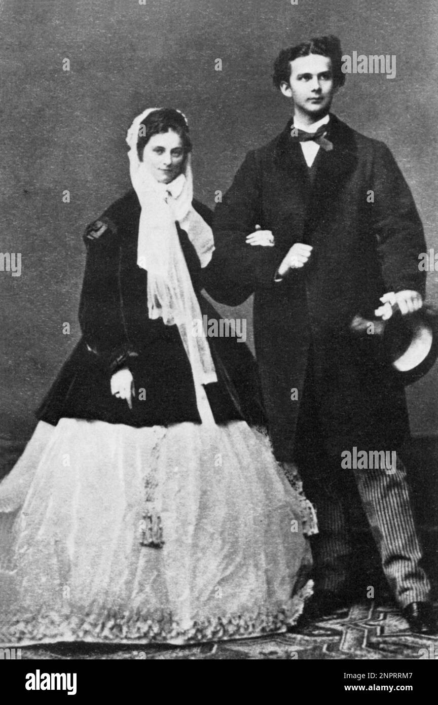 1867 : le roi du Bayern LUDWIG II de Wittelsbach ( Nymphenburg 1845 - Starnberg 1886 ) avec sa cousine SOPHIE Duchess von Bayern Wittelsbach ( 1847 - brûlé à mort à Paris 1897 ), soeur de l'impératrice Kaizerin SISSI Elisabeth d'AUTRICHE , quand a été engagé . Le lien a été oublié le 22 janvier 1867, mais dissous à nouveau huit mois plus tard. Sophie épousa plus tard en 1868 le prince Ferdinand d'Orléans Duc d'Alençon ( 1844 - 1910 ) - RE - REALI - ROYALTIES - nobili - nobiltà - BAVIERA - BAVIÈRE - noblesse allemande - fidanzati - stampa - gravure - incisione ---- Archifidavio GBB Banque D'Images
