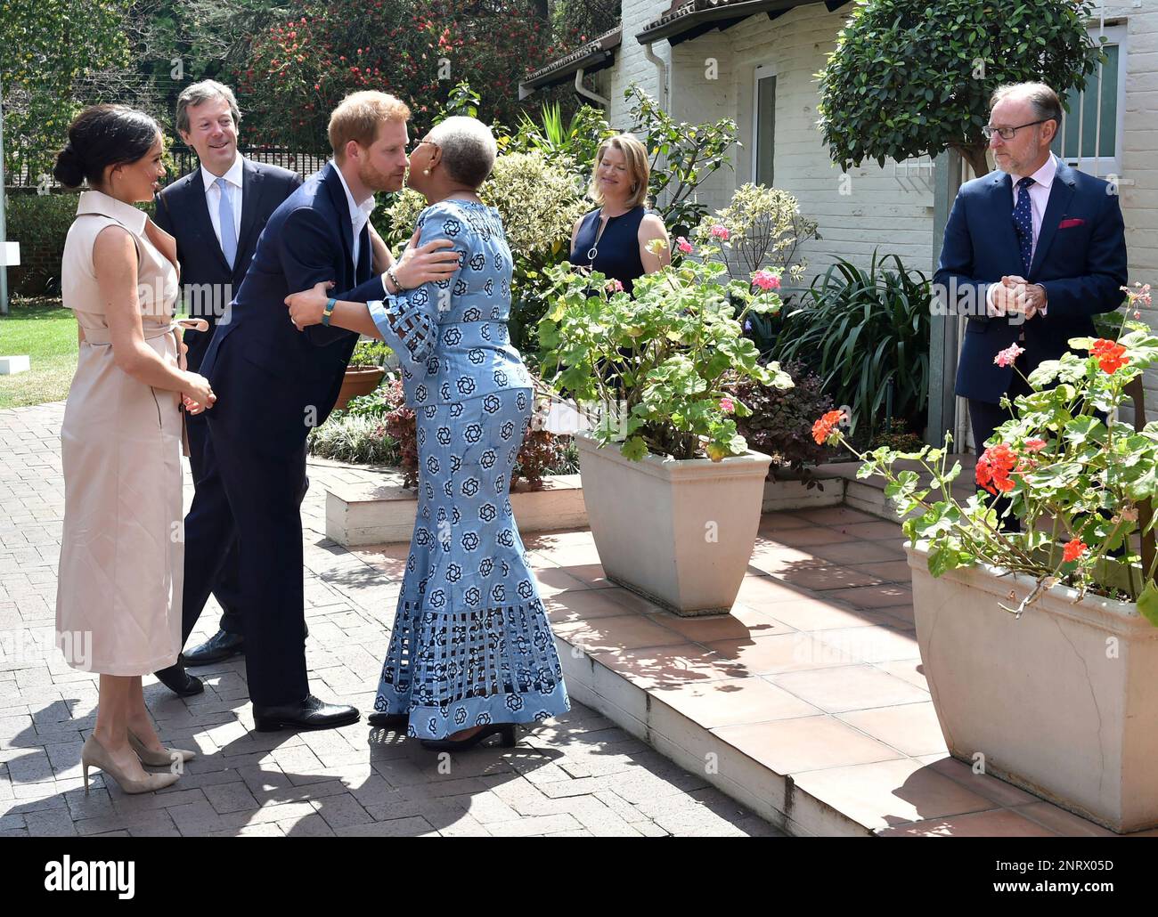 Britain's Prince Harry and his wife Meghan, Duchess of Sussex, meet with Graca Machel, the widow of the late Nelson Mandela, in Johannesburg, Wednesday Oct. 2, 2019. The couple are on the last day of their African Tour. (Itumeleng English/Pool Photo via AP) Banque D'Images