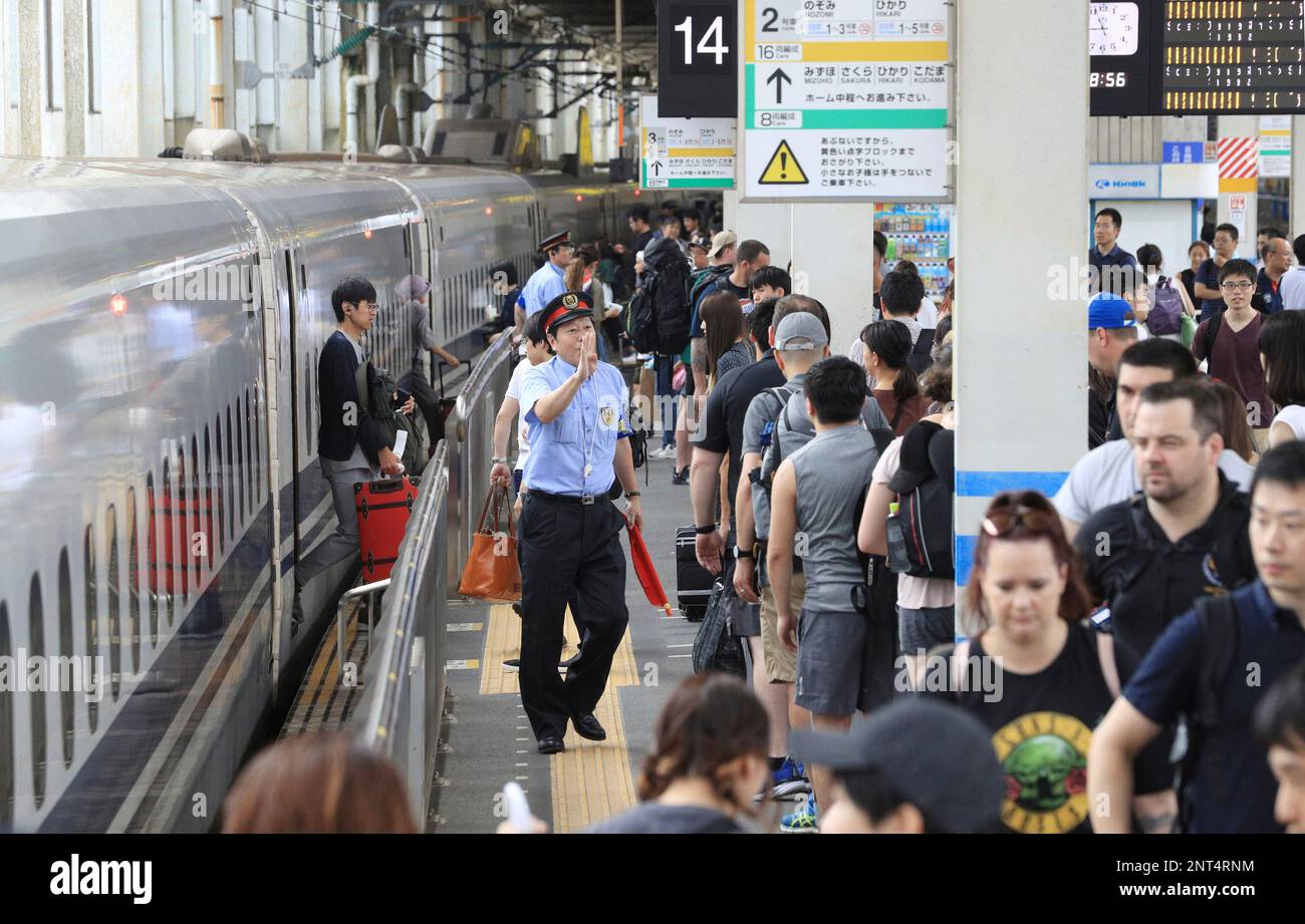 A photo shows the homecoming rush during Bon summer holiday at JR Hiroshima Station in Hiroshima on August 16, 2019. The Shinkansen (bullet train) service, which was suspended due to the typhoon Krosa (typhoon No. 10) on 15th, resumed operation, and was crowded with tourists and people returning to Tokyo from their hometown. ( The Yomiuri Shimbun via AP Images ) Banque D'Images