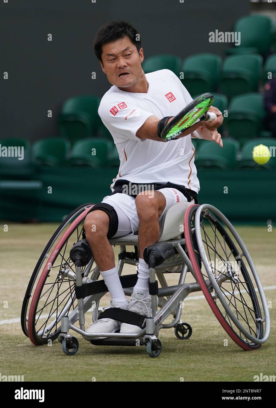 Shingo Kunieda of Japan hits a ball during the Gentlemen's Wheelchair singles final of the Championships, Wimbledon against Gustavo Fernandez of Argentina at the All England Lawn Tennis and Croquet Club in London, United Kingdom on July 14, 2019. Kunieda lost the match. ( The Yomiuri Shimbun via AP Images ) Banque D'Images
