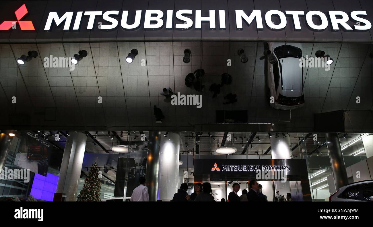 Media gathers at the headquarters of Mitsubishi Motors Corp., Japanese
