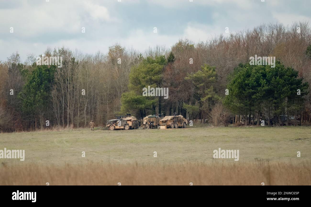 armée britannique Supacan Coyote 6x6 et Jackal 4x4 assaut rapide, pompiers et véhicules de reconnaissance dans un camp, Wiltshire Royaume-Uni Banque D'Images