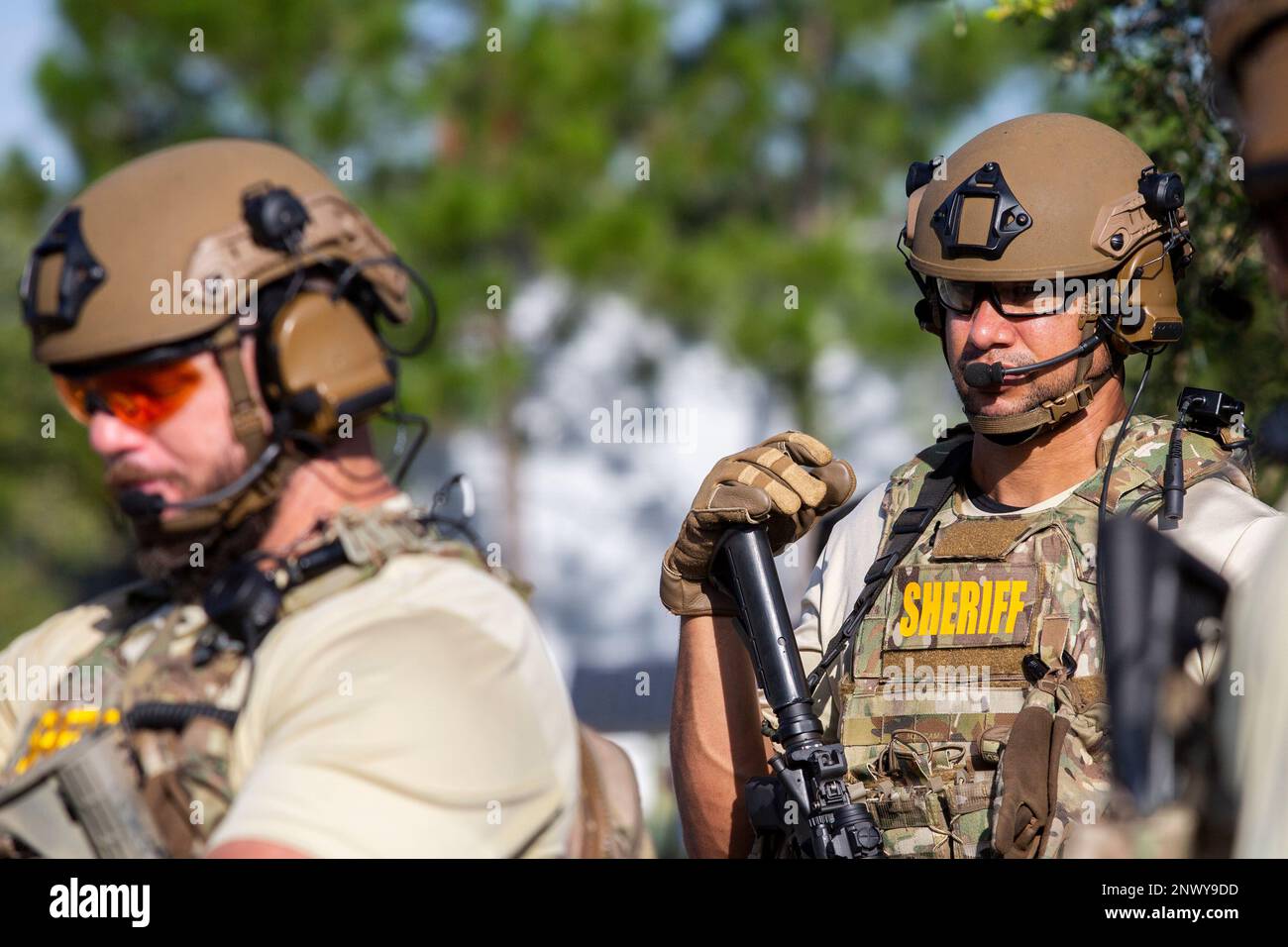 Members of Hillsborough SWAT team prepare to board a helicopter during ...