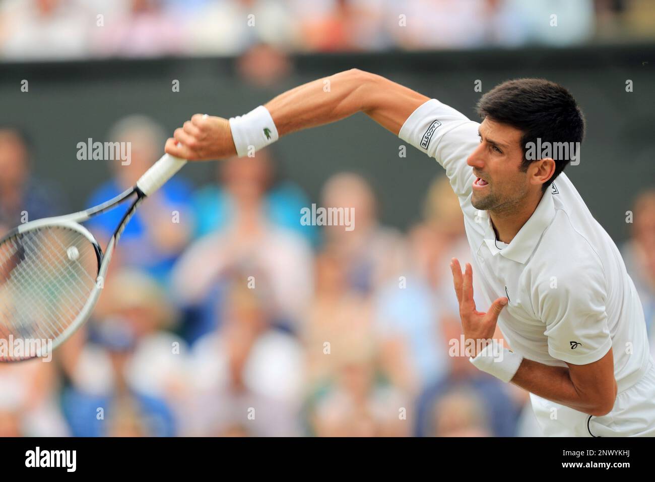 Novak Djokovic of Serbia serves during the Gentlemen's Singles Semi-finals of the Wimbledon Championships against Rafael Nadal of Spain at All England Tennis Club in London on July 14, 2018.( The Yomiuri Shimbun via AP Images ) Banque D'Images