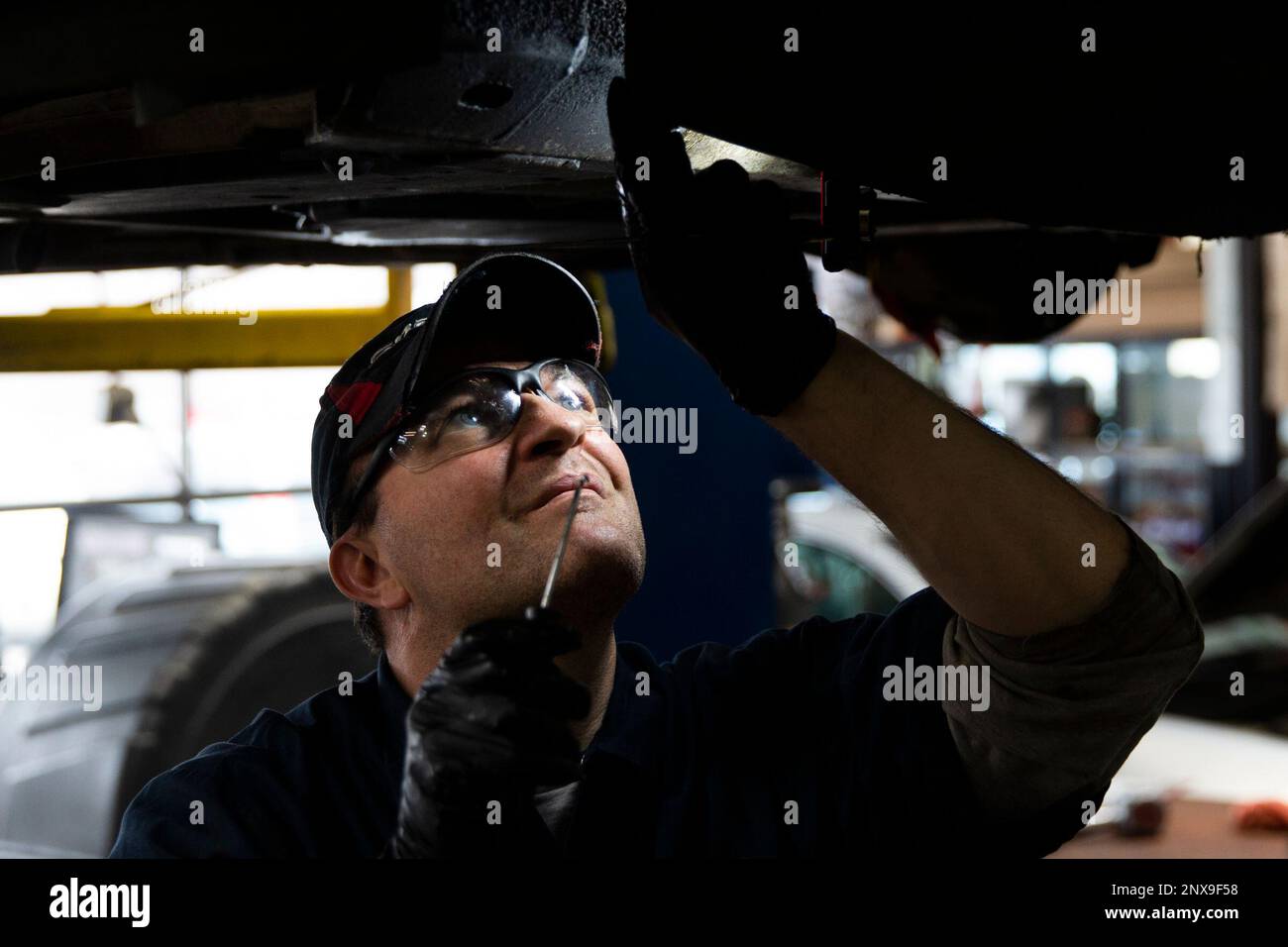 https://c8.alamy.com/compfr/2nx9f58/advance-for-weekend-editions-april-21-22-in-this-tuesday-april-10-2018-photo-auto-technician-john-buttner-inspects-the-undercarriage-of-a-car-at-lift-garage-in-minneapolis-looking-at-a-quote-for-a-repair-at-a-for-profit-shop-this-would-have-been-1500-or-2000-here-550-insane-buttner-said-after-a-career-in-ministry-and-social-work-lift-garage-founder-cathy-heying-went-to-back-to-school-to-become-a-mechanic-evan-frost-minnesota-public-radio-via-ap-2nx9f58.jpg