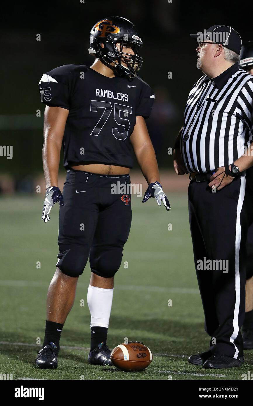 Erie Cathedral Prep Ramblers defensive lineman Fredrick Scruggs (75) talks to an official during the 2017 high school football game against the against the Cleveland Benedictine Bengals, Friday, Sept. 15, 2017 in Erie, Pa. The Ramblers won the game 62-28. (Paul Spinelli via AP) Banque D'Images