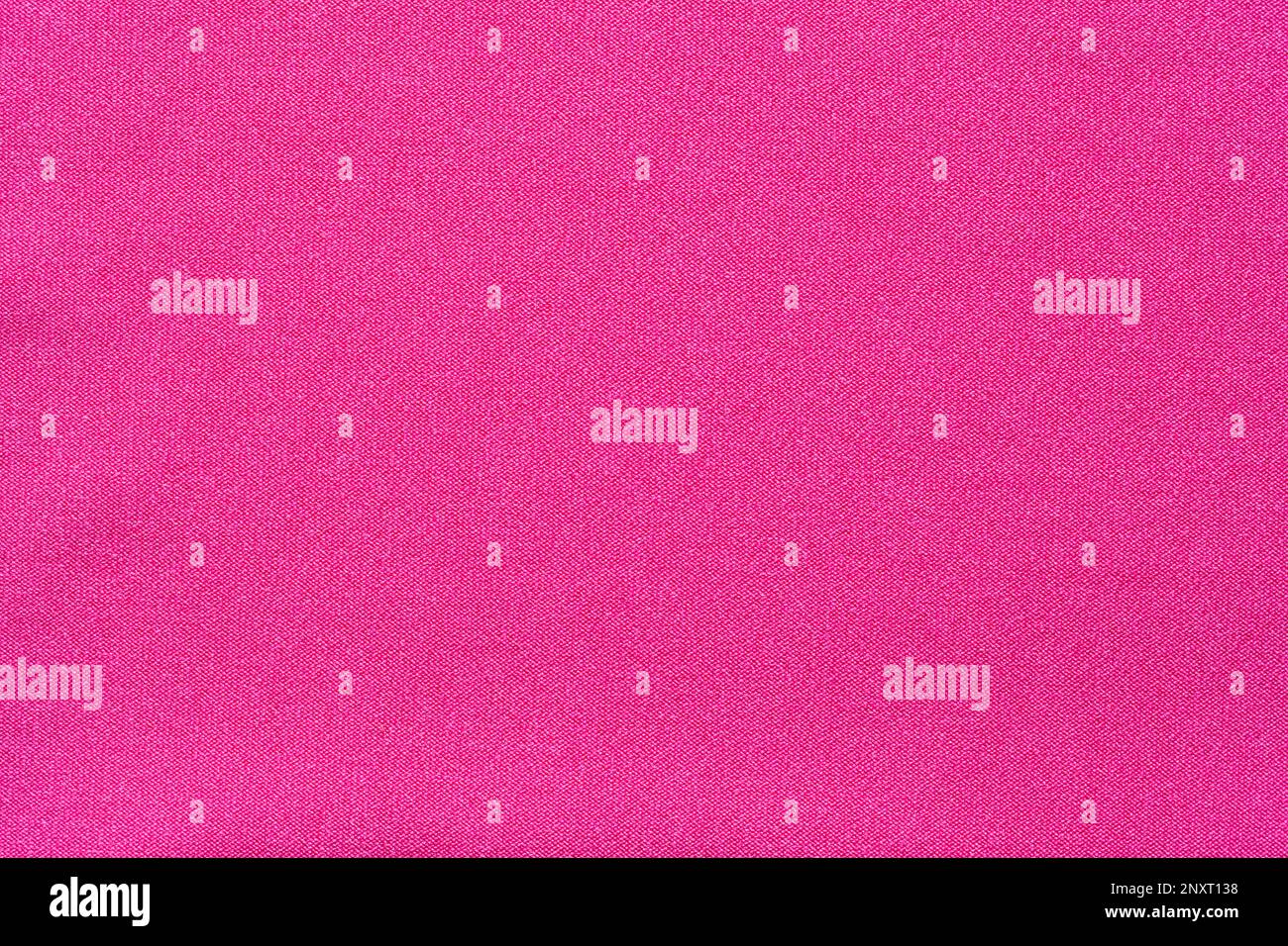 Gros plan en tissu polyester rose plat. Banque D'Images