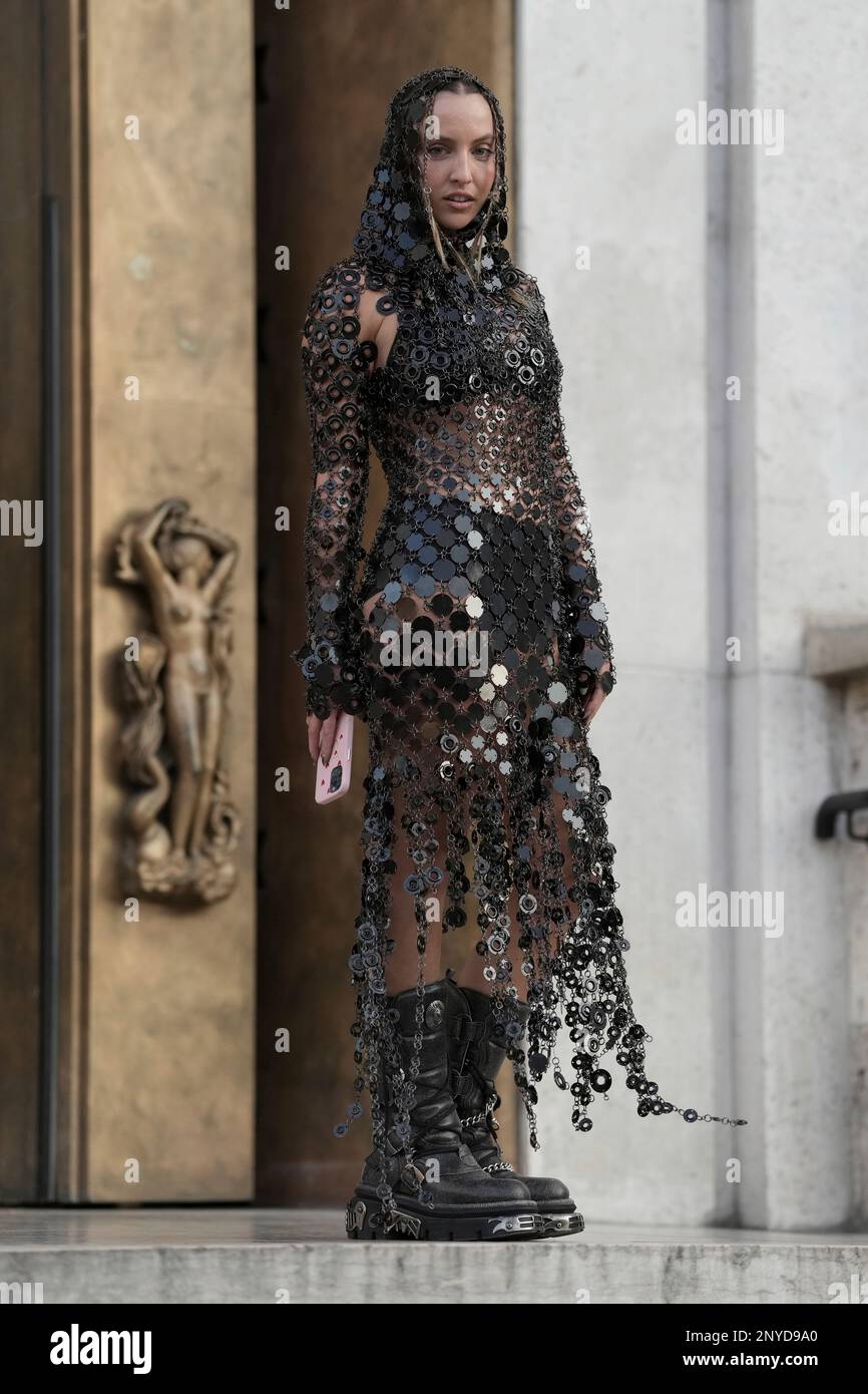 Carla Ginola poses for photographers upon arrival at the Paco Rabanne