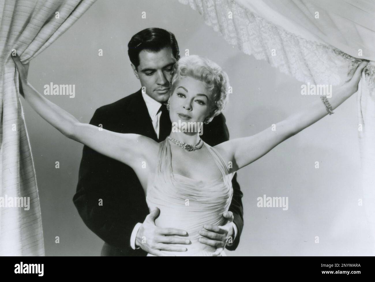 L'acteur américain John Gavin et l'actrice Lana Turner dans le film imitation de la vie, USA 1959 Banque D'Images