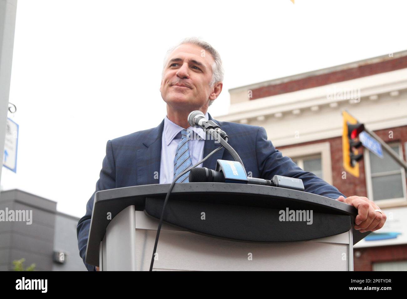 Carolina Hurricanes general manager Ron Francis pauses for an emotional moment during a street naming ceremony in his honor in his hometown of Sault Ste. Marie, Ontario, Wednesday, Oct. 5, 2016. The ceremony to rename part of a downtown street as 'Ron Francis Way' was held before a pre-season NHL hockey game between the Hurricanes and the Buffalo Sabres at the Essar Centre in Sault Ste. Marie. (Kenneth Armstrong/The Canadian Press via AP) Banque D'Images
