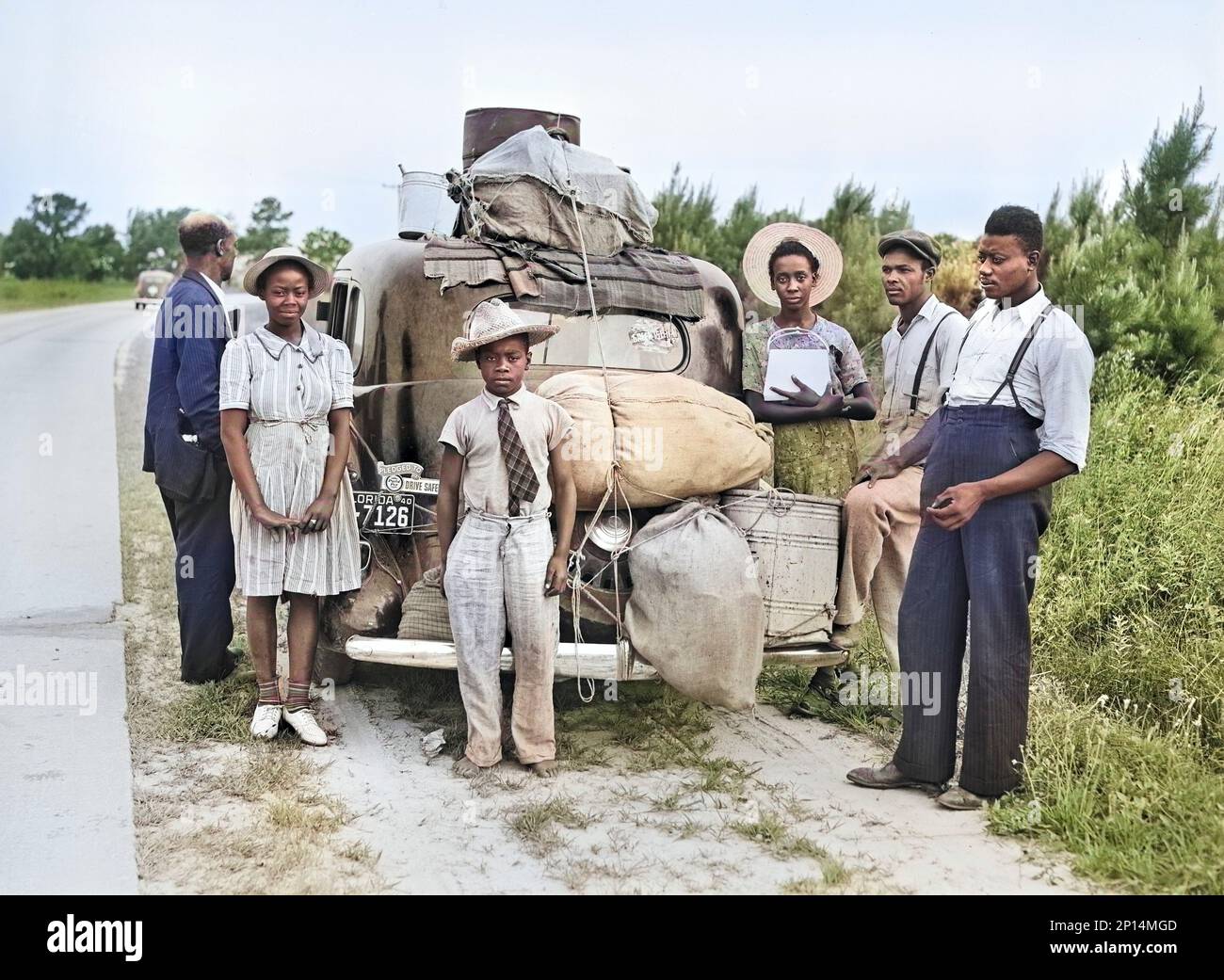 Groupe de migrants de Floride sur leur chemin à Cranberry, New Jersey, pour cueillir des pommes de terre, près de Shawboro, Caroline du Nord, États-Unis, Jack Delano, États-Unis Administration de la sécurité agricole, juillet 1940 Banque D'Images