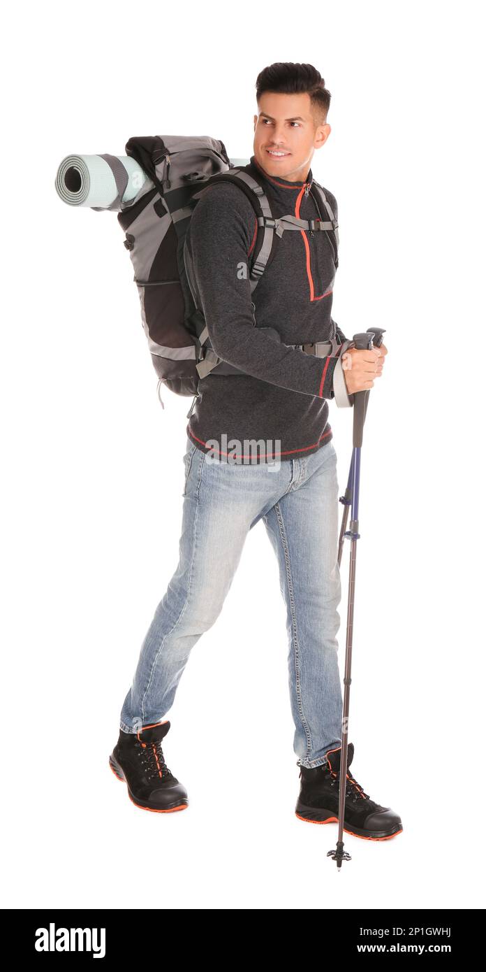 Randonneur mâle avec sac à dos et bâtons de randonnée sur fond blanc Banque D'Images