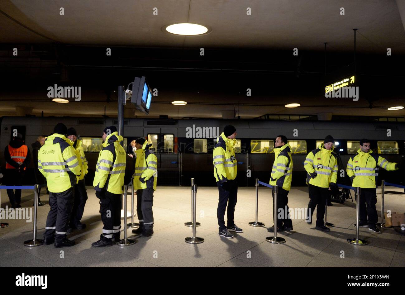 Security personnel wait for passengers at the train station Copenhagen