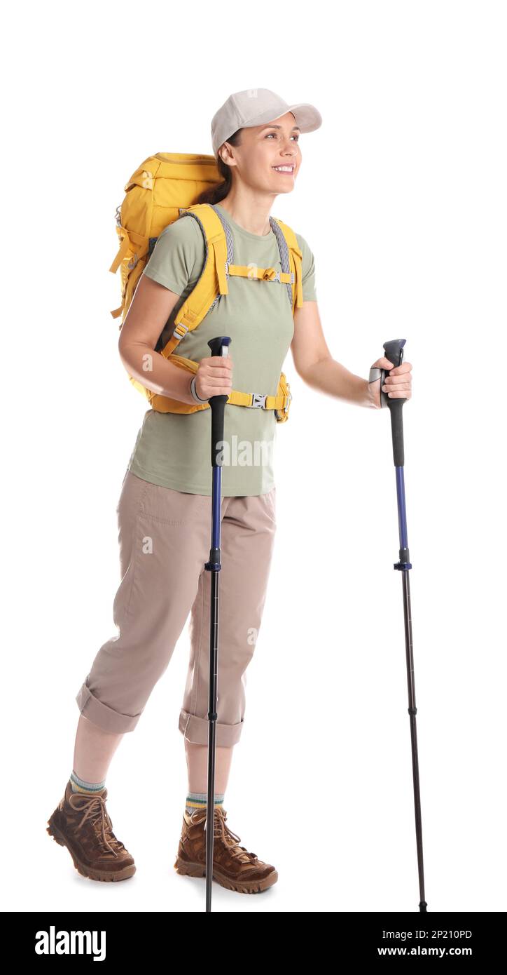 Randonneur féminin avec sac à dos et bâtons de randonnée sur fond blanc Banque D'Images