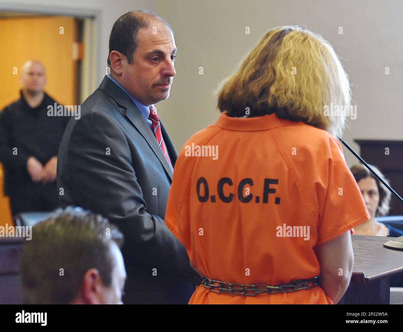 From left, defense attorney Greg Starczewski stands with his client