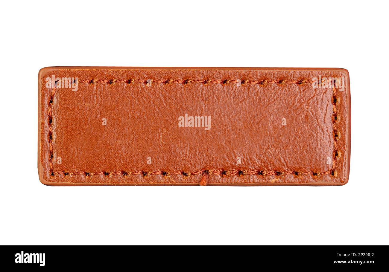 Longue étiquette de Jean en cuir marron, étiquette isolée sur blanc, vue du dessus Banque D'Images