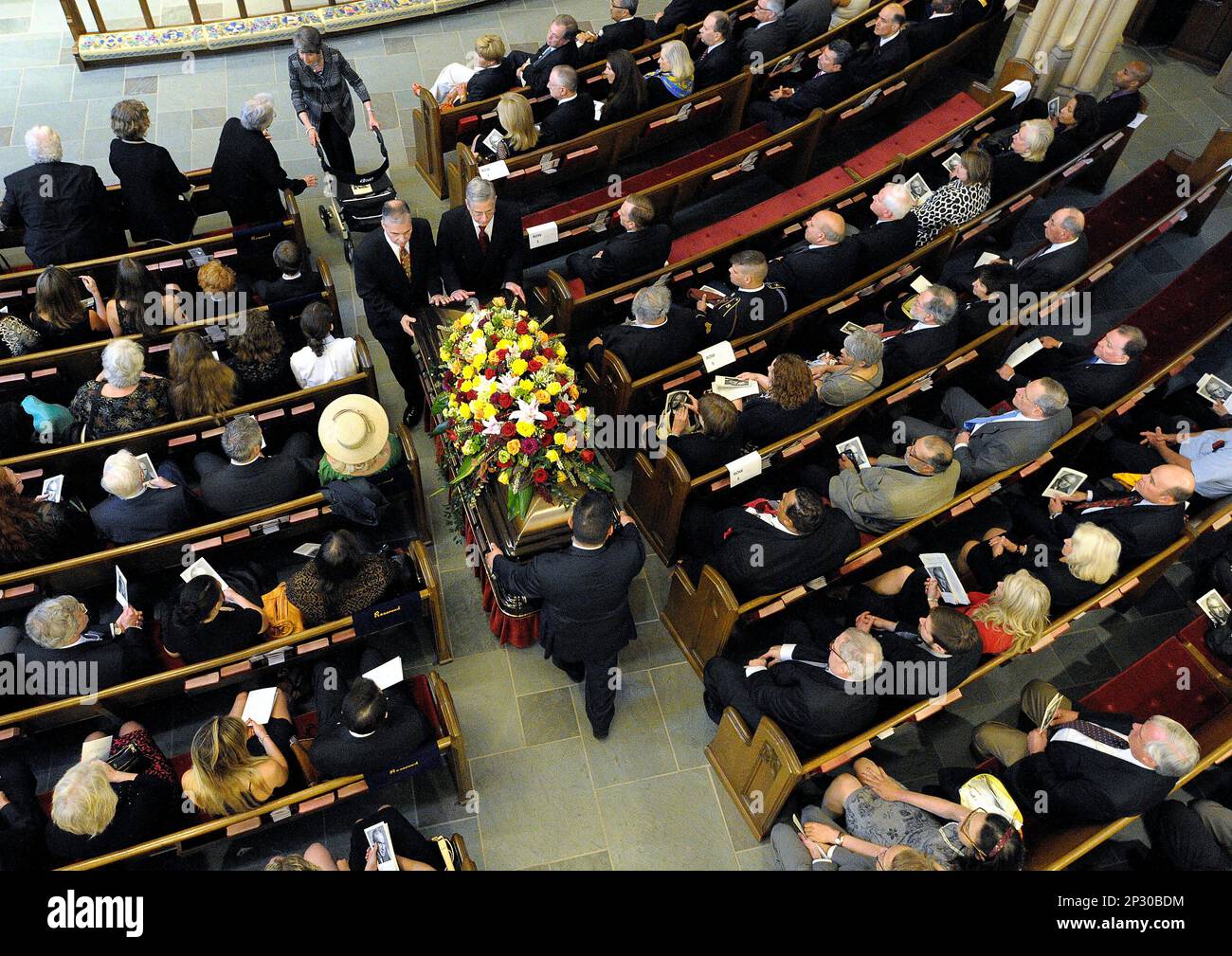People attend the funeral service for Jim Wright, the former Speaker of