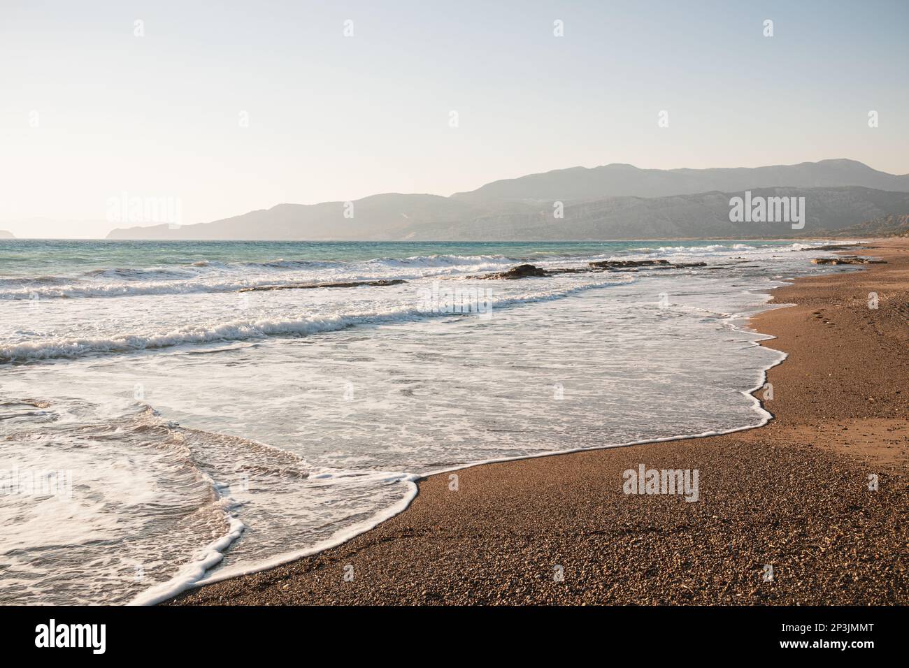 Coucher de soleil sur la plage - Rhodes, Grèce Banque D'Images