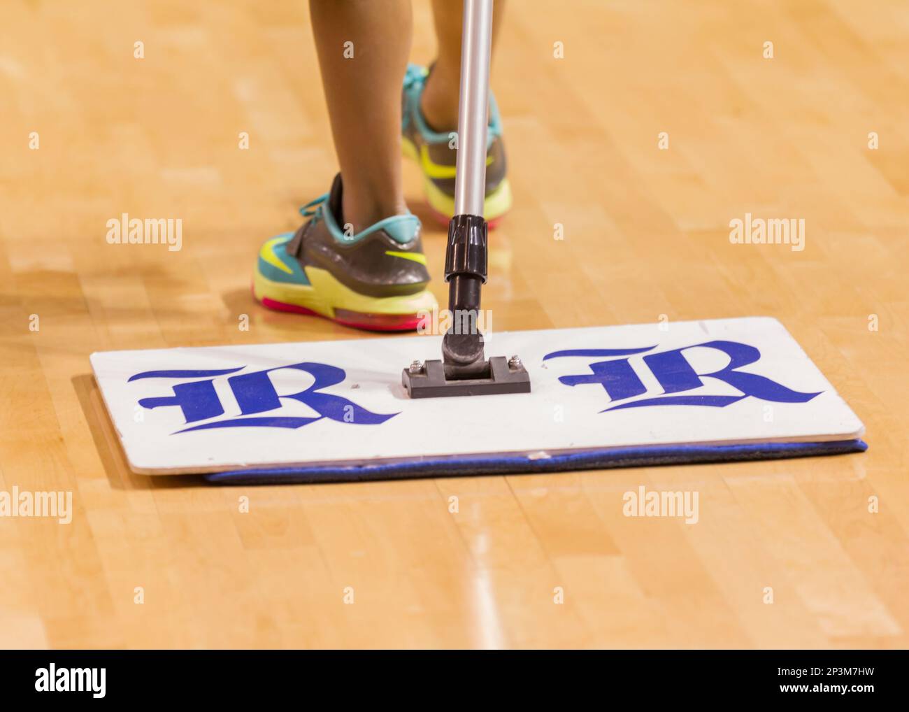 January 10, 2015 Cleaning the court floor during the NCAA Men's