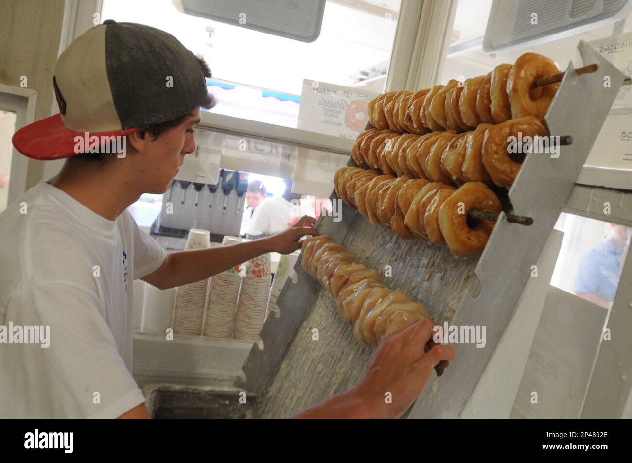 Blake Eadie makes donuts at Britts Donuts in Carolina Beach, N.C