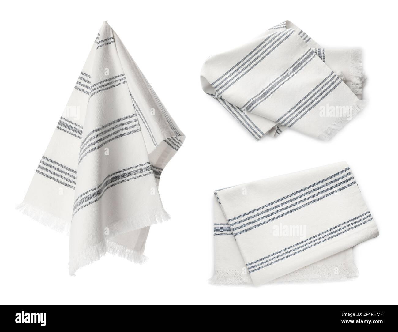 Ensemble avec des serviettes de cuisine propres sur fond blanc Banque D'Images