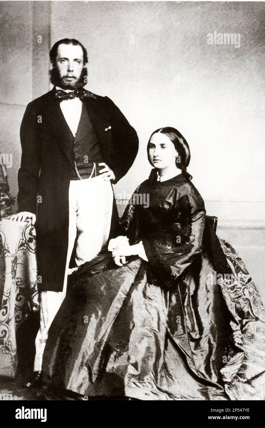 1860 CA, AUTRICHE : l'empereur Kaiser MAXIMILIEN Ferdinand du Mexique ( 1832 - 1867 ) , gouverneur de Lombardo-Veneto ( 1857 ) , frère de Kaiser Franz Josef I . Sur cette photo avec sa femme Empresse Charlotte ( 1840 - 1927) , princesse de Belgique - ASBURGO - ABSBURG - ASBURG - ASBURGO - ABSBURGO - NOBLESSE - NOBILI - Nobiltà - REALI - ROYAUTÉ - barbe - barba - CARLOTTA di MIRAMARE - MASSIMILIANO FERDINANDO Imperatore del MESSICO - coniugi - marito e moglie - polady - arballot - aret poleza - points d'intérêt - catena dell' orologio da taschino - raso --- Archivio GBB Banque D'Images