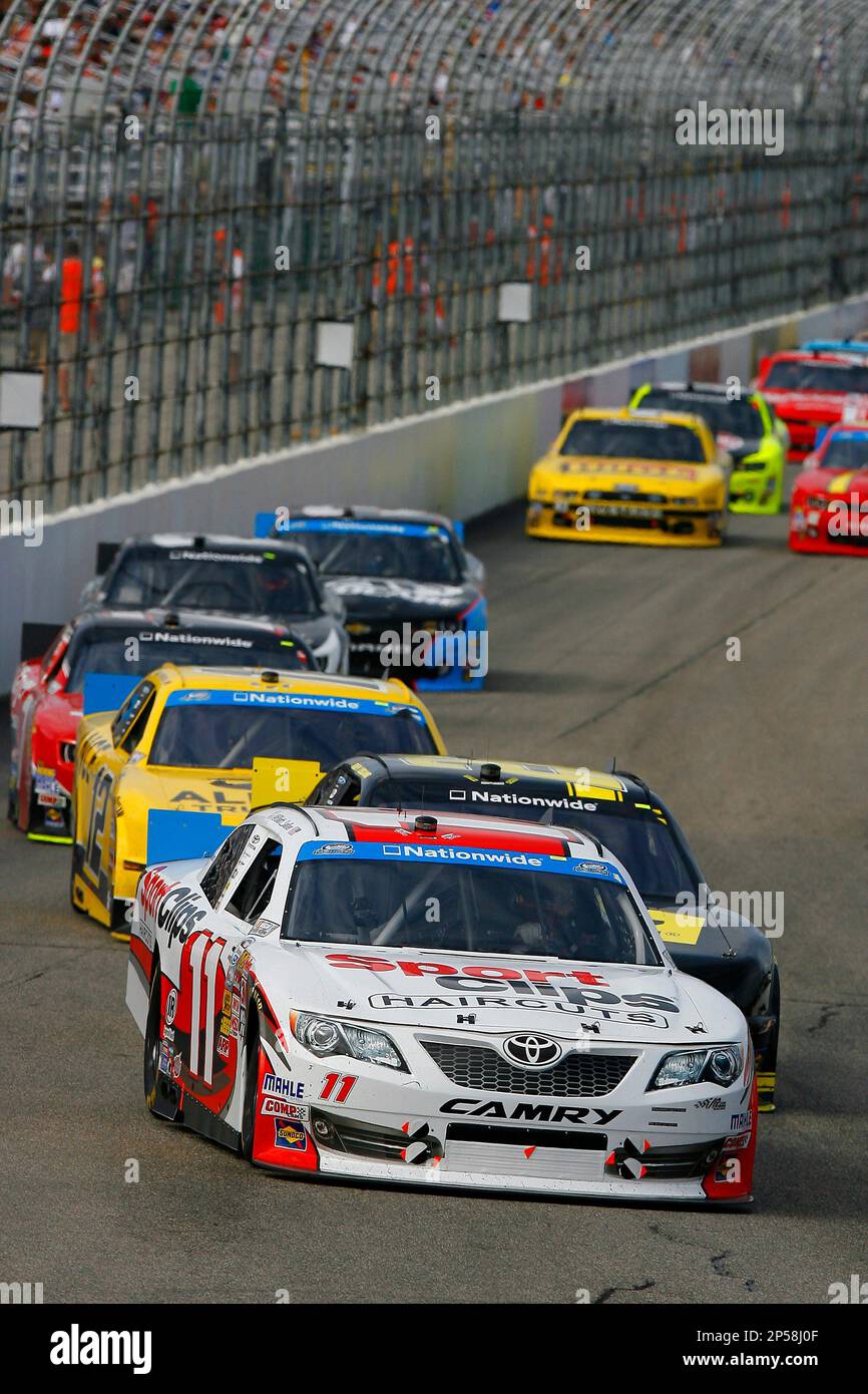 Elliott Sadler (11), Joey Logano (22) and Sam Hornish Jr. (12) during the NASCAR Nationwide Series CNBC Prime's The Profit 200 race at New Hampshire Motor Speedway, Saturday, July 13, 2013, in Loudon, N.H. (AP Photo/Autostock, Russell LaBounty) MANDATORY CREDIT Banque D'Images