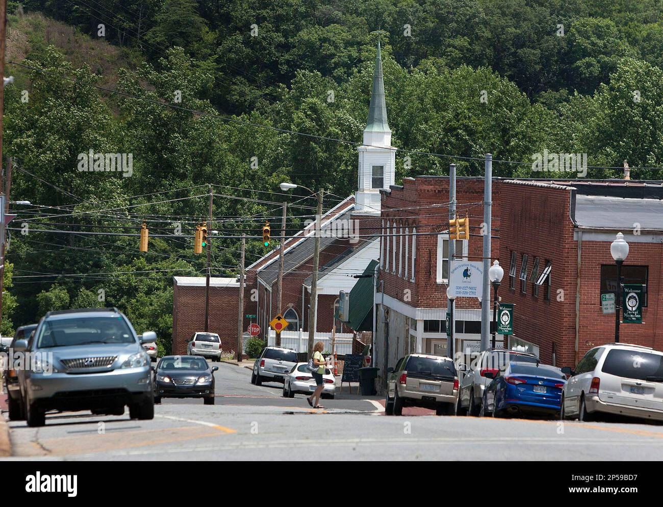 The town of Mayodan is seen June 27, 2013, in Mayodan, N.C. The Washington Mill is being torn down for scrap materials as the listing does not prevent a property’s owner from destroying it. Mayodan is trying to distance itself from the neighboring town of Madison and create its own identity according to the town manager, Michael Brandt. (AP Photo/News & Record, Lynn Hey) Banque D'Images