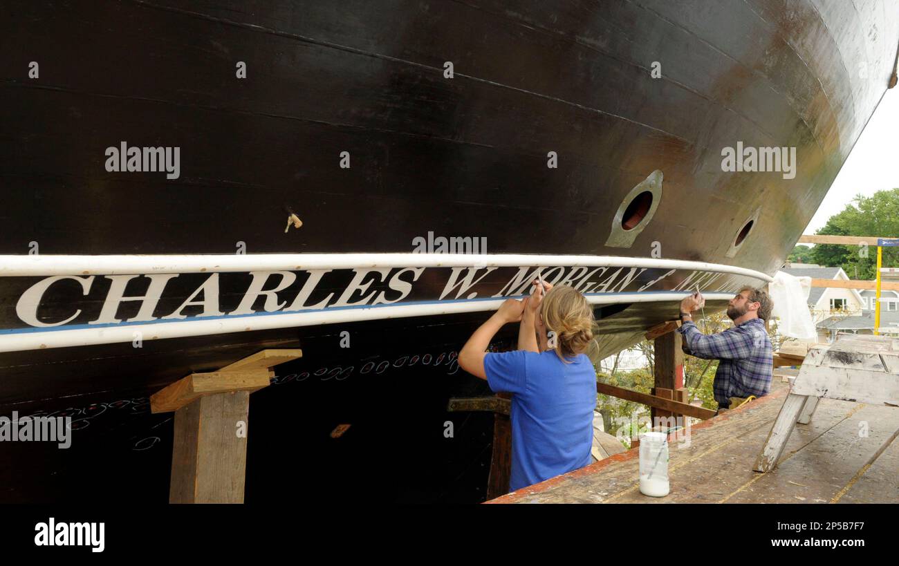 Shelly Larsen and Gary Anderson put a second coat of primer on the ...