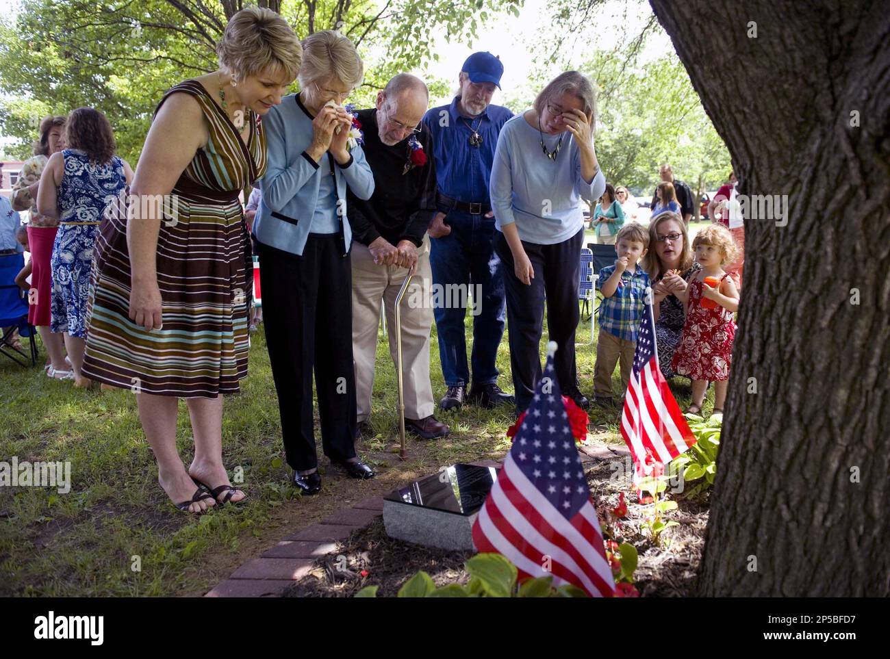 Family members of Lance Cpl. Thomas McBride, including his mom and dad