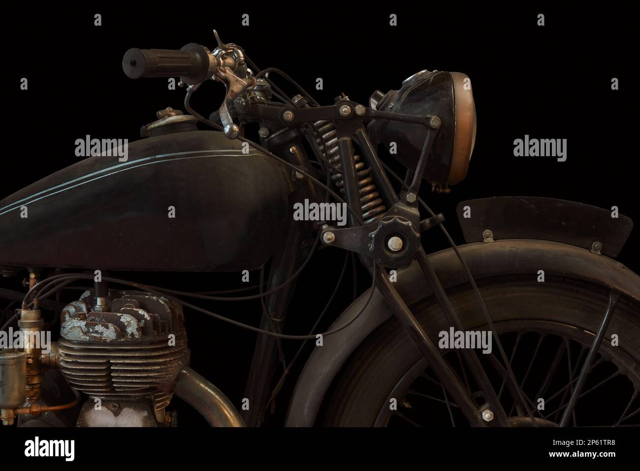 Moto anglaise vintage avec un fond noir Banque D'Images