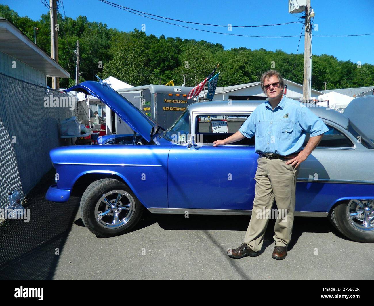 Mike Faillace of Dimock, Pa., stands next to the 1955 Chevrolet that he