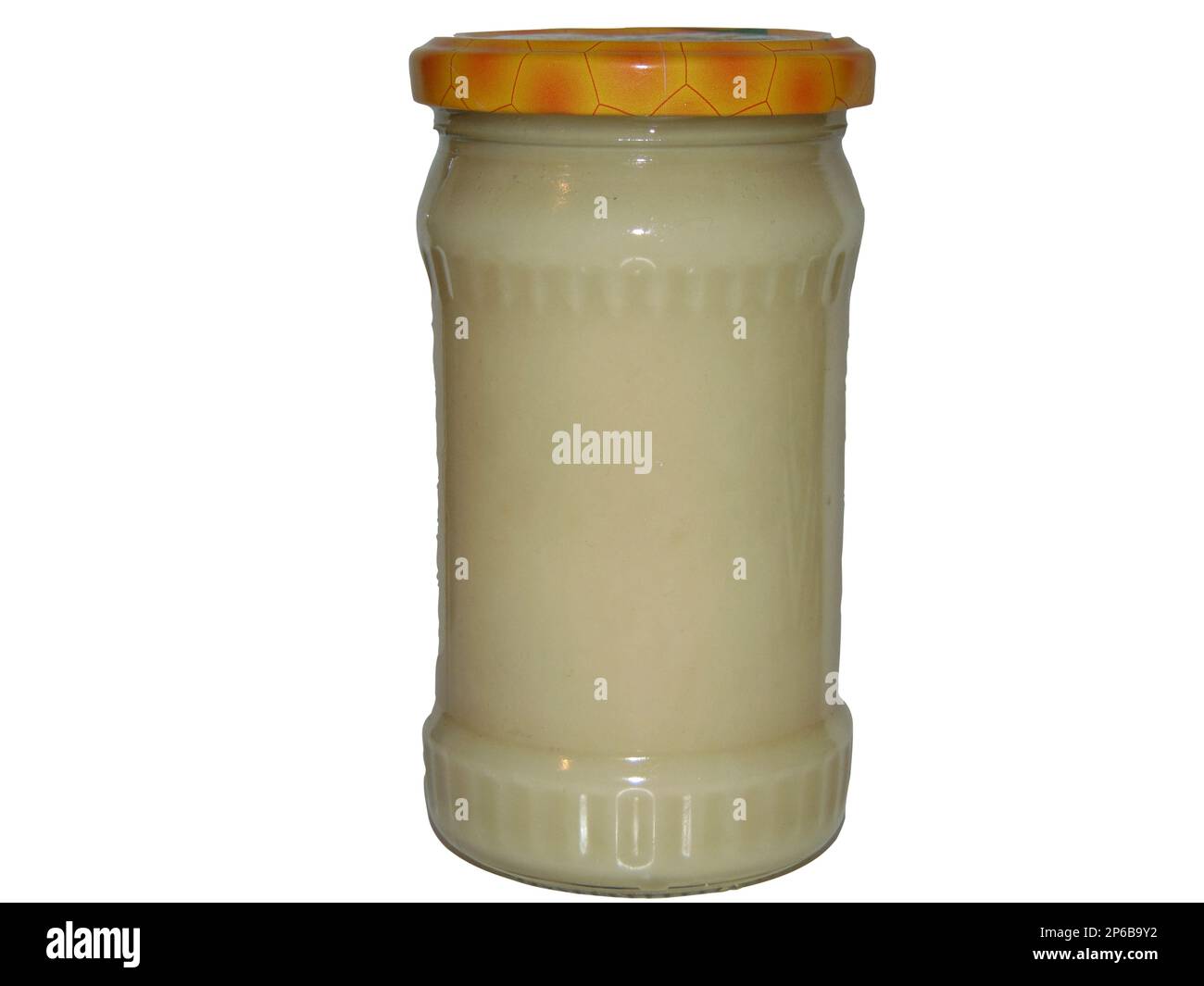 un pot de miel de colza isolé sur blanc Banque D'Images