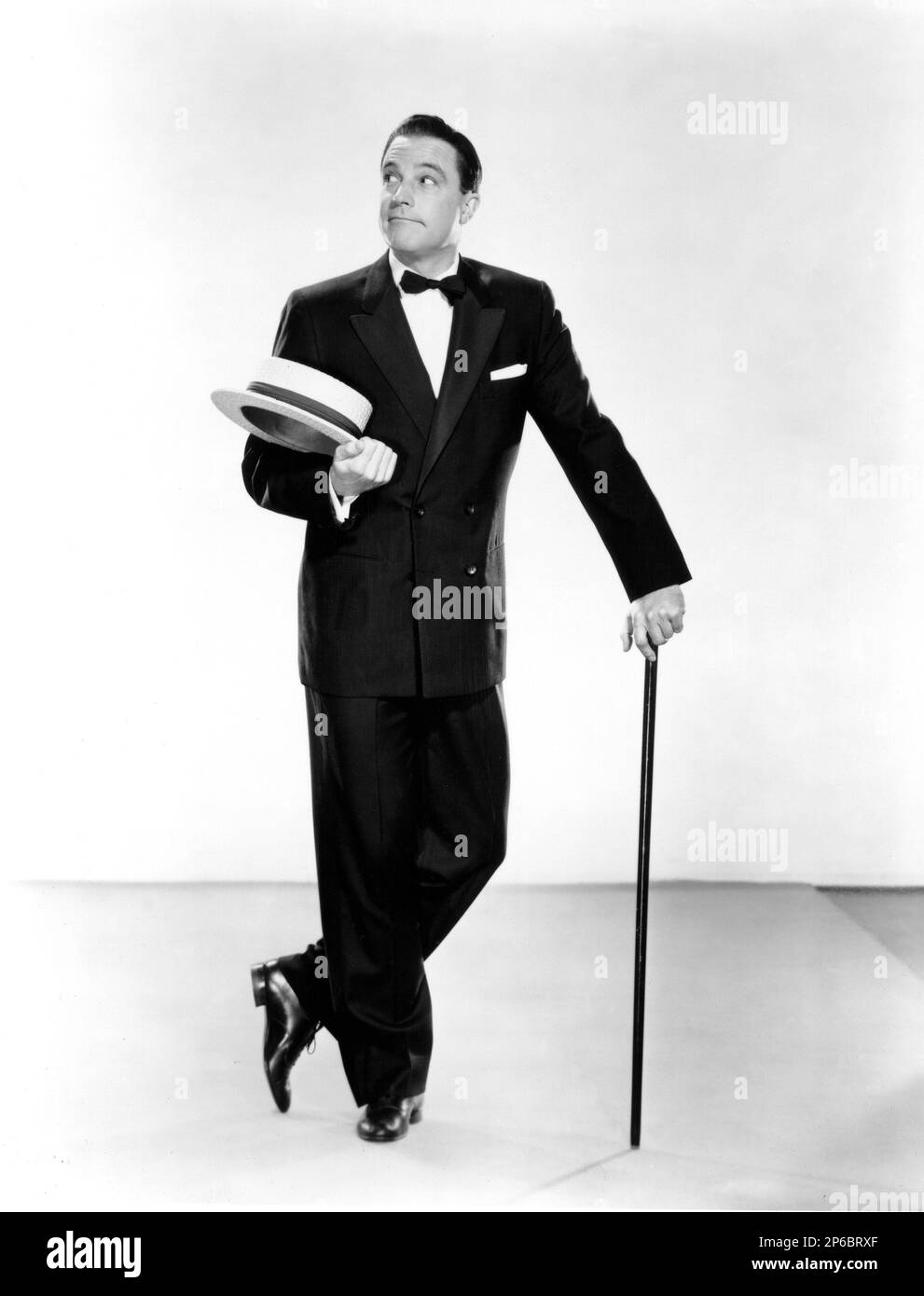 1951 , USA : l'acteur et danseur GENE KELLY ( 1912 - 1986 ) dans UN AMÉRICAIN À PARIS ( un AMERICANO A PARIGI ) par Vincente Minnelli . - FILM - CINÉMA - FILM - MUSICAL - DANSE - DANZA - BALLETTO - BALLETT - ballerino - bastone da passeggio - canne - chapeau - cappello - paglietta --- Archivio GBB Banque D'Images