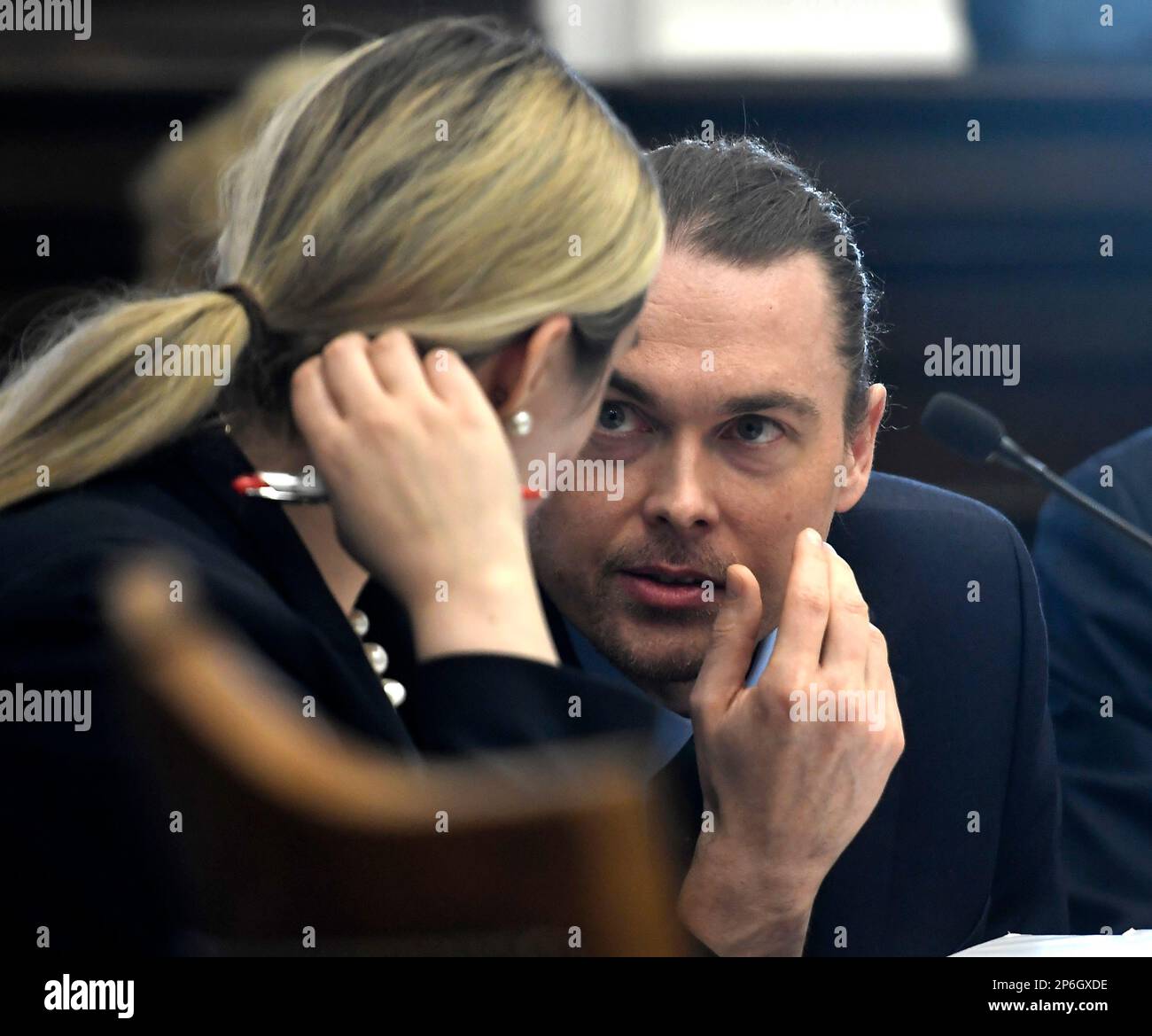 Zachariah Anderson, right, speaks with his attorney Nicole Muller