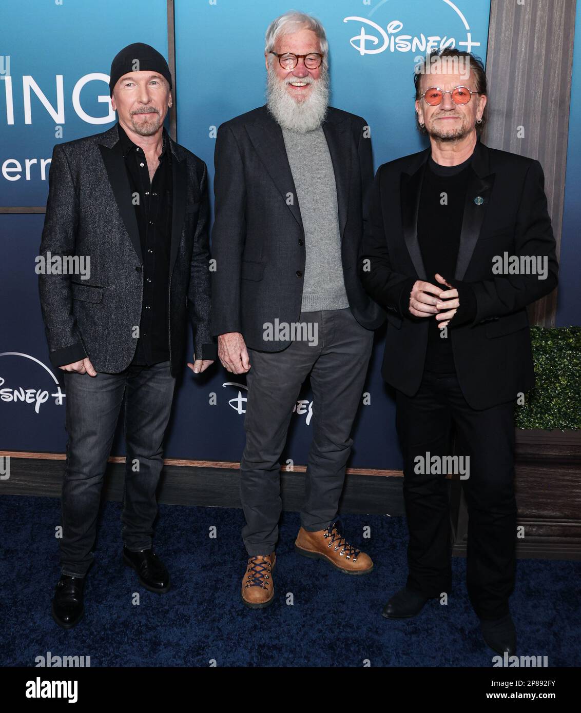 LOS ANGELES, CALIFORNIE, ÉTATS-UNIS - 08 MARS : Le musicien, chanteur et compositeur irlandais The Edge (David Howell Evans), animateur de télévision, comédien, écrivain et producteur américain Dave Letterman (David Michael Letterman) et le chanteur-compositeur irlandais, activiste et philanthrope irlandais Bono (Paul David Hewson) arrivent à la première de Los Angeles de Disney's Music Docu-Special 'Bono & The Edge: Une sorte de Homecoming, avec Dave Letterman tenu au Théâtre Orpheum sur 8 mars 2023 à Los Angeles, Californie, États-Unis. (Photo de Xavier Collin/image Press Agency) Banque D'Images