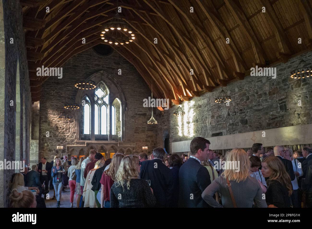 Banquet après une conférence scientifique médicale au Haakon’s Hall de Bergenshus Fortress à Bergen, Norvège. La fortification a été construite vers 1240. Banque D'Images