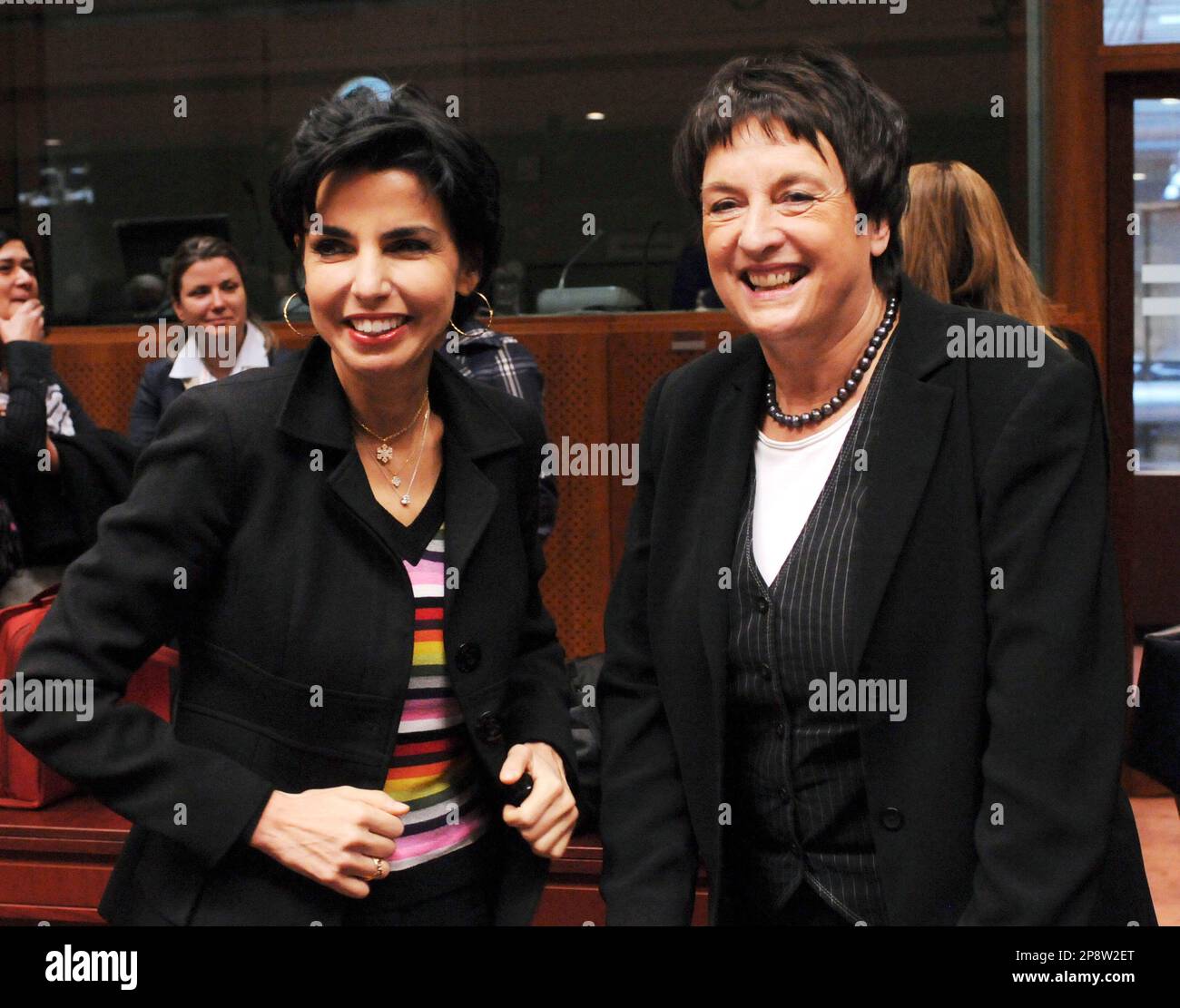 France's Justice Minister Rachida Dati, left, and Germany's Justice Minister Brigitte Zypries, right, are seen prior to the start of the European Union Justice Council of Ministers held at the EU Council building in Brussels, Friday, Feb. 27, 2009. (AP Photo/Thierry Charlier) Banque D'Images