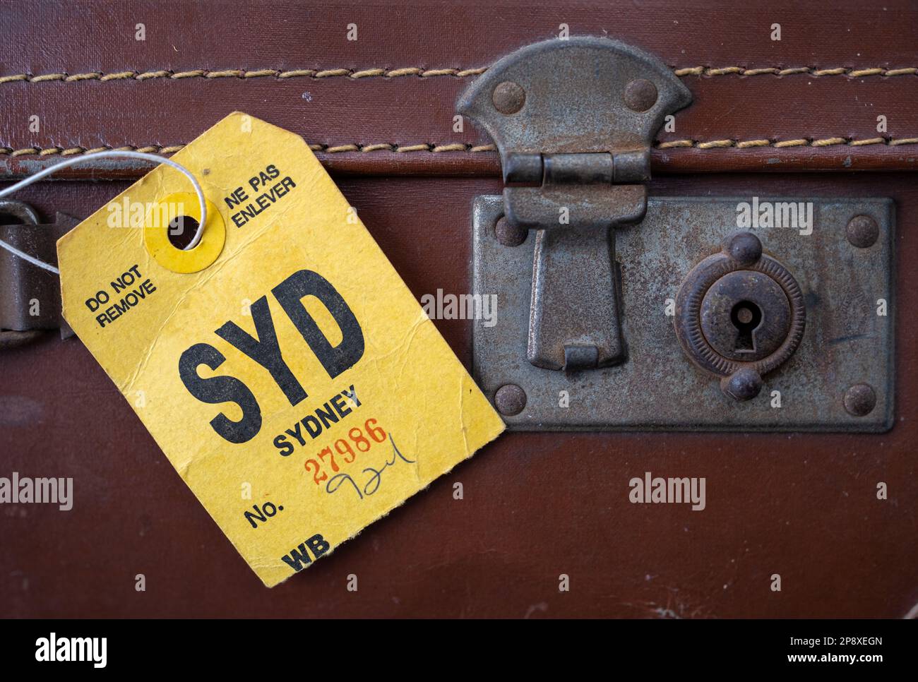 Une étiquette de bagage rétro sur Une valise Vintage, pour Sydney, Australie Banque D'Images