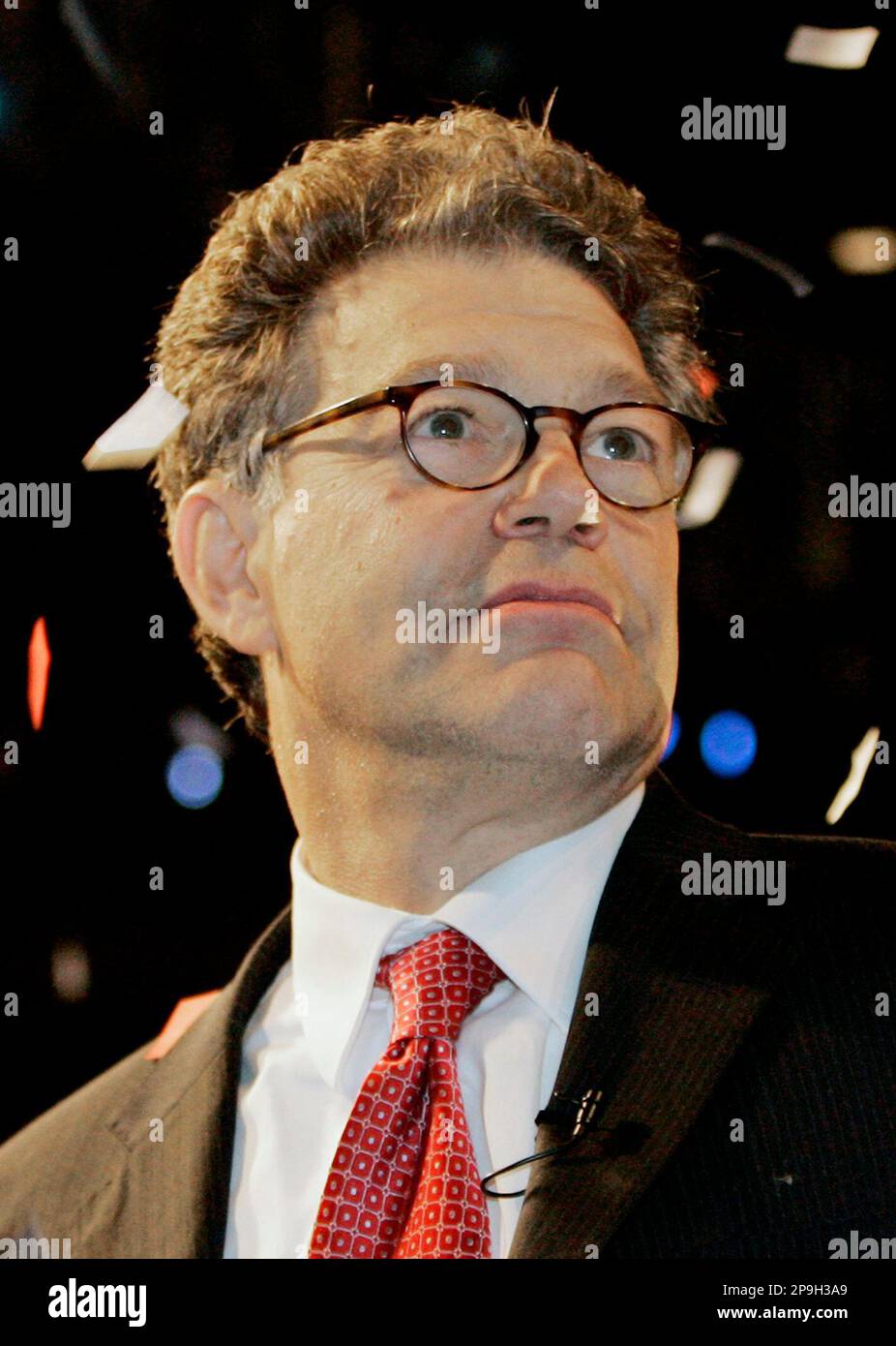 ** ADVANCE FOR WEEKEND EDITIONS OCT. 25-26 ** FILE ** In this file photo, confetti falls around former comedian Al Franken after he accepted the Democratic endorsement for U.S. Senate Senate from Minnesota June 7, 2008 at the party's state convention in Rochester, Minn. Franken faces incumbent Republican Sen. Norm Coleman and Independence Party candidate Dean Barkley in the upcoming election. (AP Photo/Jim Mone,file) Banque D'Images
