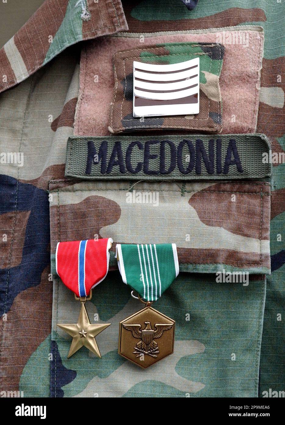 U.S. Bronze Star Medal, left and Army Commendation Medal, right are