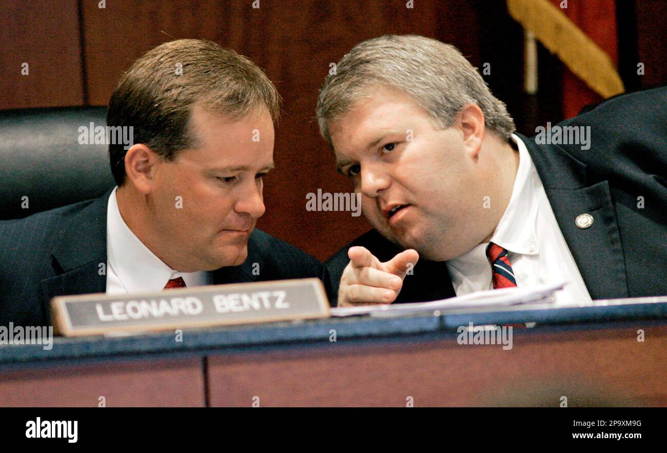 Mississippi Public Service Commissioners Leonard Bentz, left, and