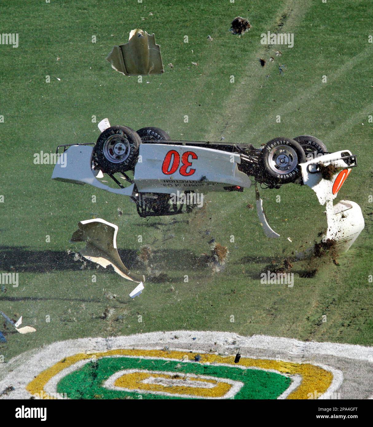 Tad Segars rolls his car down the front stretch during the Thunder Car 50 auto race prior to the NASCAR Sprint All-Star Race at Lowe's Motor Speedway in Concord, N.C., Saturday, May 17, 2008. Segars walked away from the crash. (AP Photo/Gerry Broome) Banque D'Images