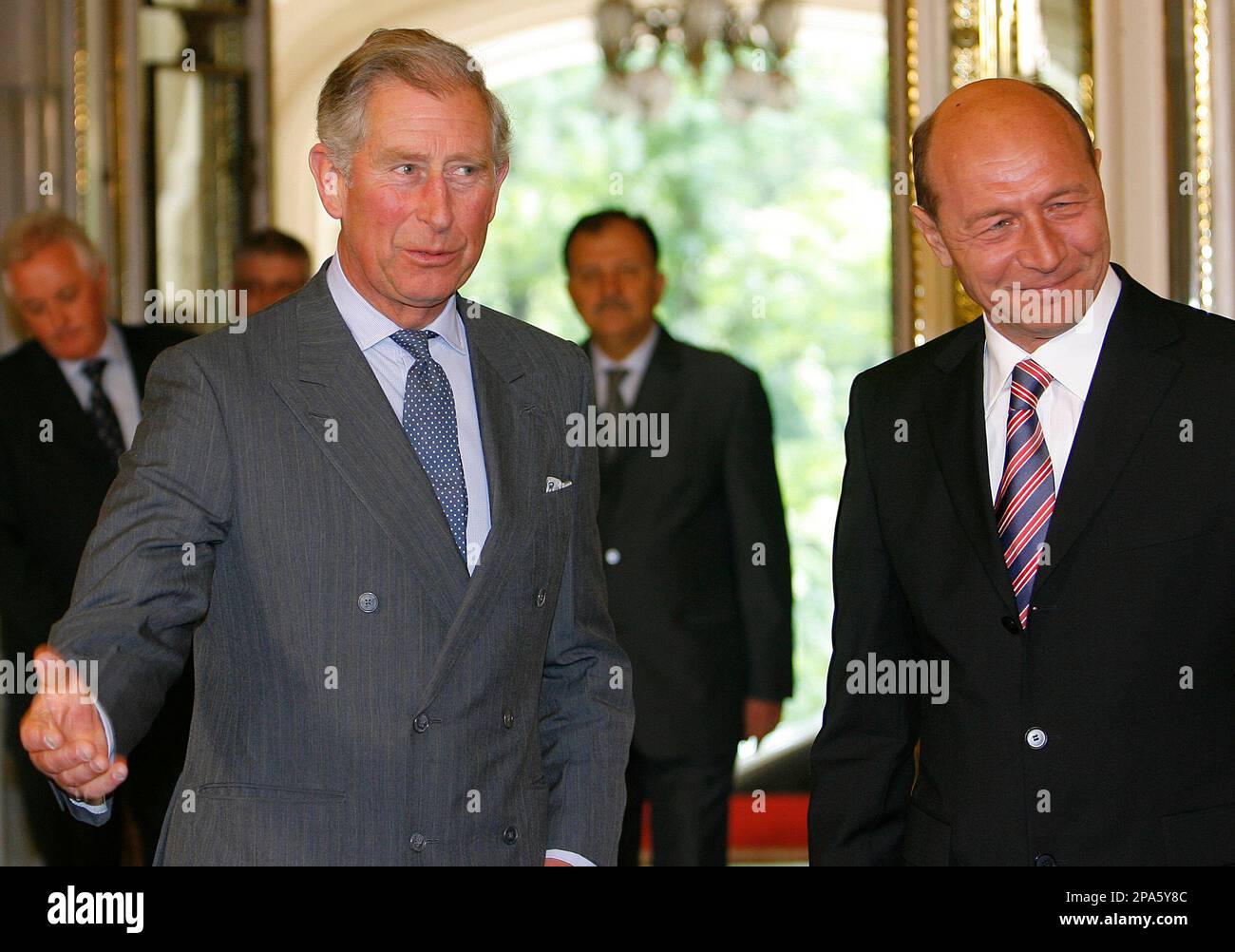 Britain's Prince Charles, left, gestures together with Romania's President Traian Basescu, right, upon arriving at the Cotroceni Presidential Palace in Bucharest Romania Tuesday May 6 2008. The Prince of Wales starts a private visit to Romania.(AP Photo/Vadim Ghirda) Banque D'Images