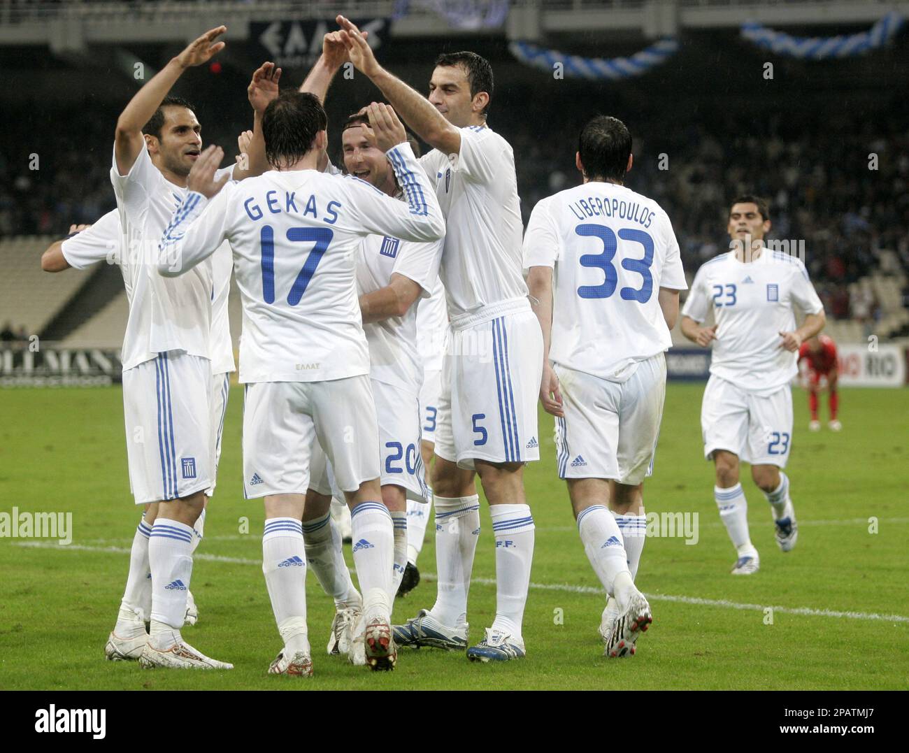 Greece's players celebrate a goal against Malta during their UEFA Euro 2008 group C qualifying round soccer match at Athens' Olympic Stadium Saturday, Nov. 17, 2007. Greece won 5-0. (AP Photo/Petros Giannakouris) Banque D'Images