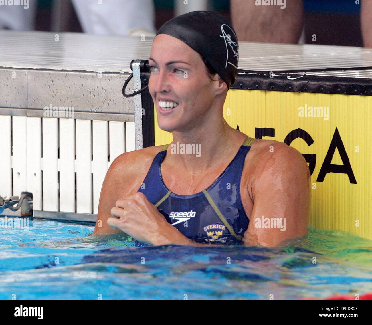 Sweden's new swimming world record holder, Therese Alshammar celebrates